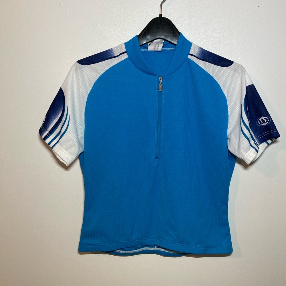NWT Louis Garneau Women’s Blue Cycling Top. Size Large